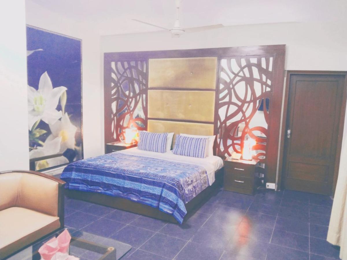 Hotel Rooms Dha Karachi Quarto foto